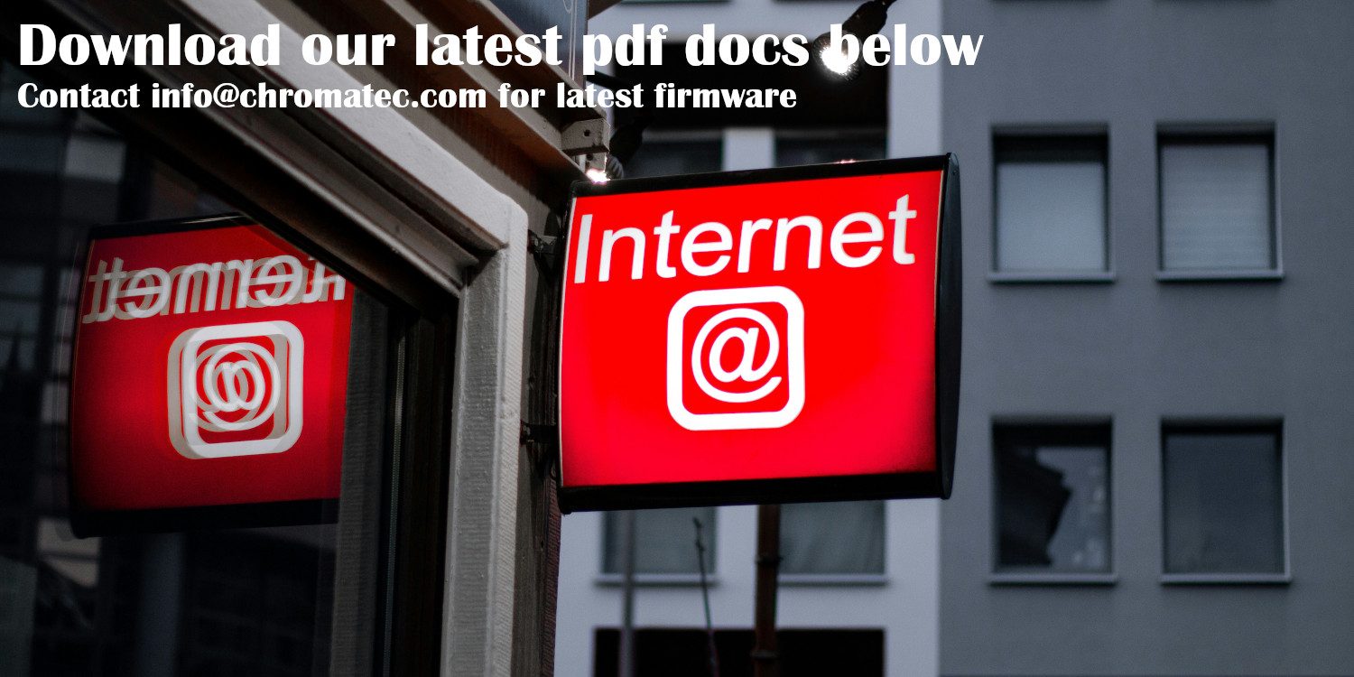There image shows a red and white "internet" sign adjacent to a large window.